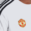 เสื้อทีเชิ้ตแมนเชสเตอร์ ยูไนเต็ด Essentials Single Jersey 3-Stripes ของแท้