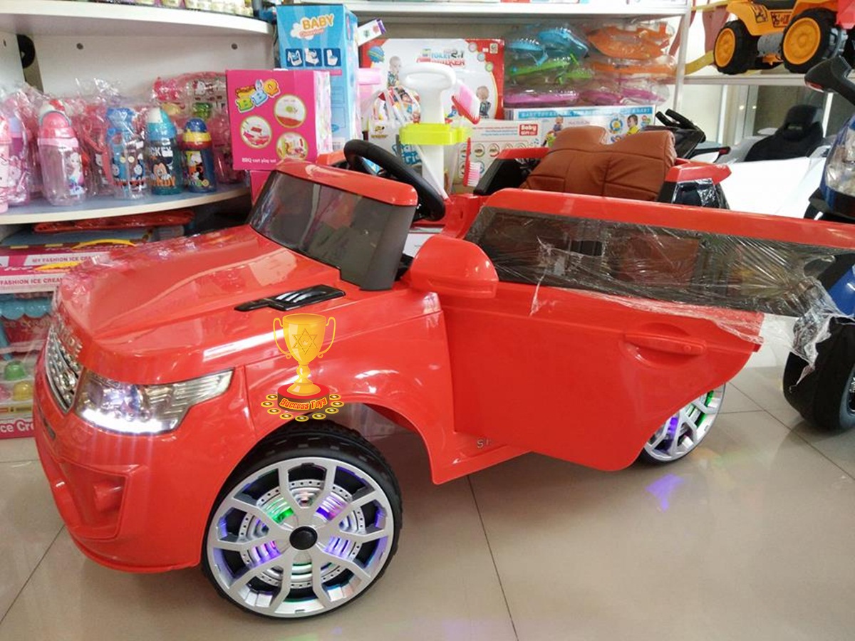 รถแบตเตอรี่เด็กนั่งไฟฟ้า ยี่ห้อ LAND ROVER เบาะหนัง 2m สีแดง