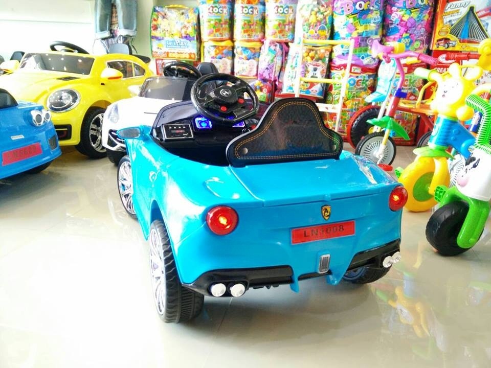 รถแบตเตอรี่เด็กนั่งไฟฟ้า ยี่ห้อ MiNi FERRARI 2m สีฟ้า