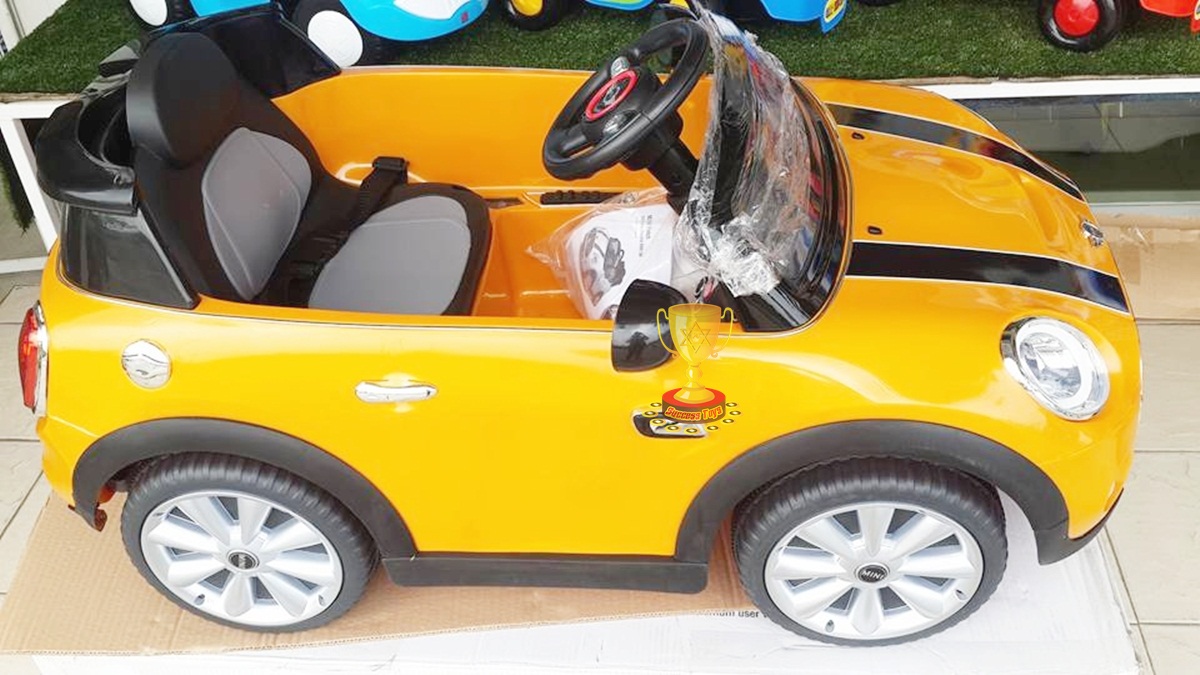 รถแบตเตอรี่เด็กนั่งไฟฟ้า รุ่น JE195 ยี่ห้อ MINI COOPER (งานแท้) สีเหลือง