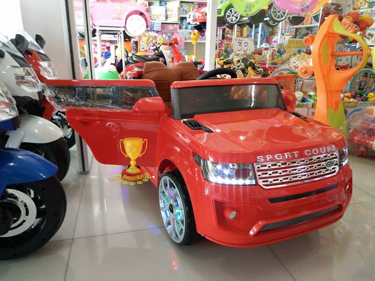 รถแบตเตอรี่เด็กนั่งไฟฟ้า ยี่ห้อ LAND ROVER เบาะหนัง 2m สีแดง