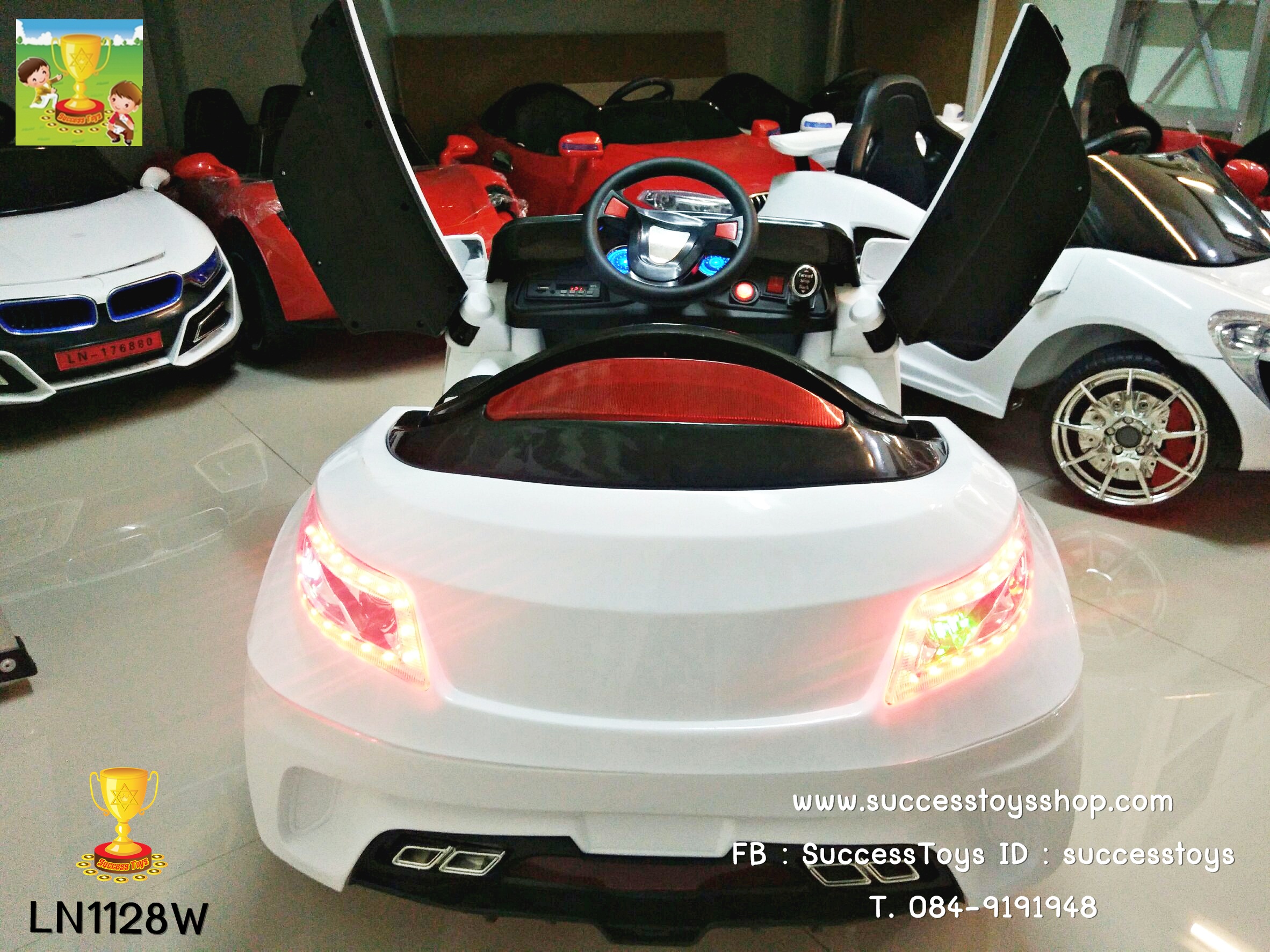 LN1128W รถแบตเตอรี่เด็กนั่งไฟฟ้า ยี่ห้อ BMW ประตูปีกนก มี 2 สี ขาว / แดง