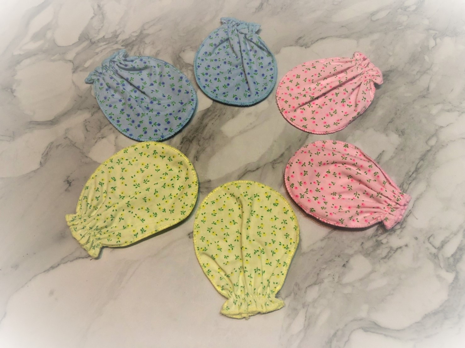 ถุงมือเด็กพิมพ์ลายผ้าโทเร