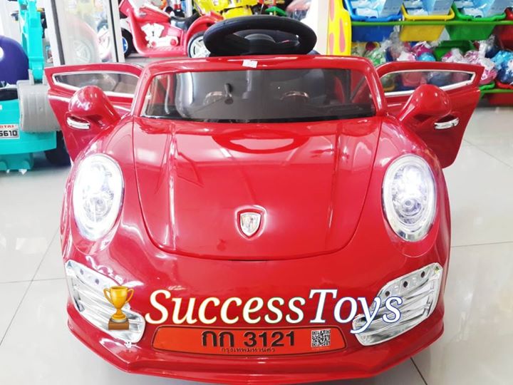 กก3121 รถแบตเตอรี่เด็กนั่งไฟฟ้า รุ่นนี้มีโช๊ค เปิดประตูได้ สีแดง
