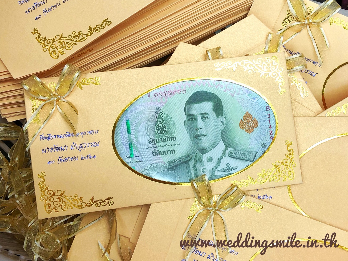 ของชำร่วยงานแต่ง ซองใส่ธนบัตร วงรีใหญ่ (T) สั่งซื้อขั้นต่ำ 100 ใบ พร้อมพิมพ์ พร้อมโบว์ ใบละ 16.-/ คาดริบบิ้นรอบซอง 18.-