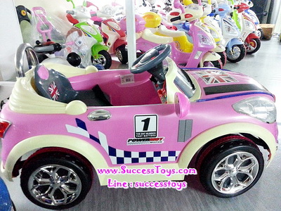 รถแบตเตอรี่เด็กนั่ง รุ่น BH3056 New Mini ลายธงล้อชุบ มี 4 สี เขียว แดง ฟ้า ชมพู