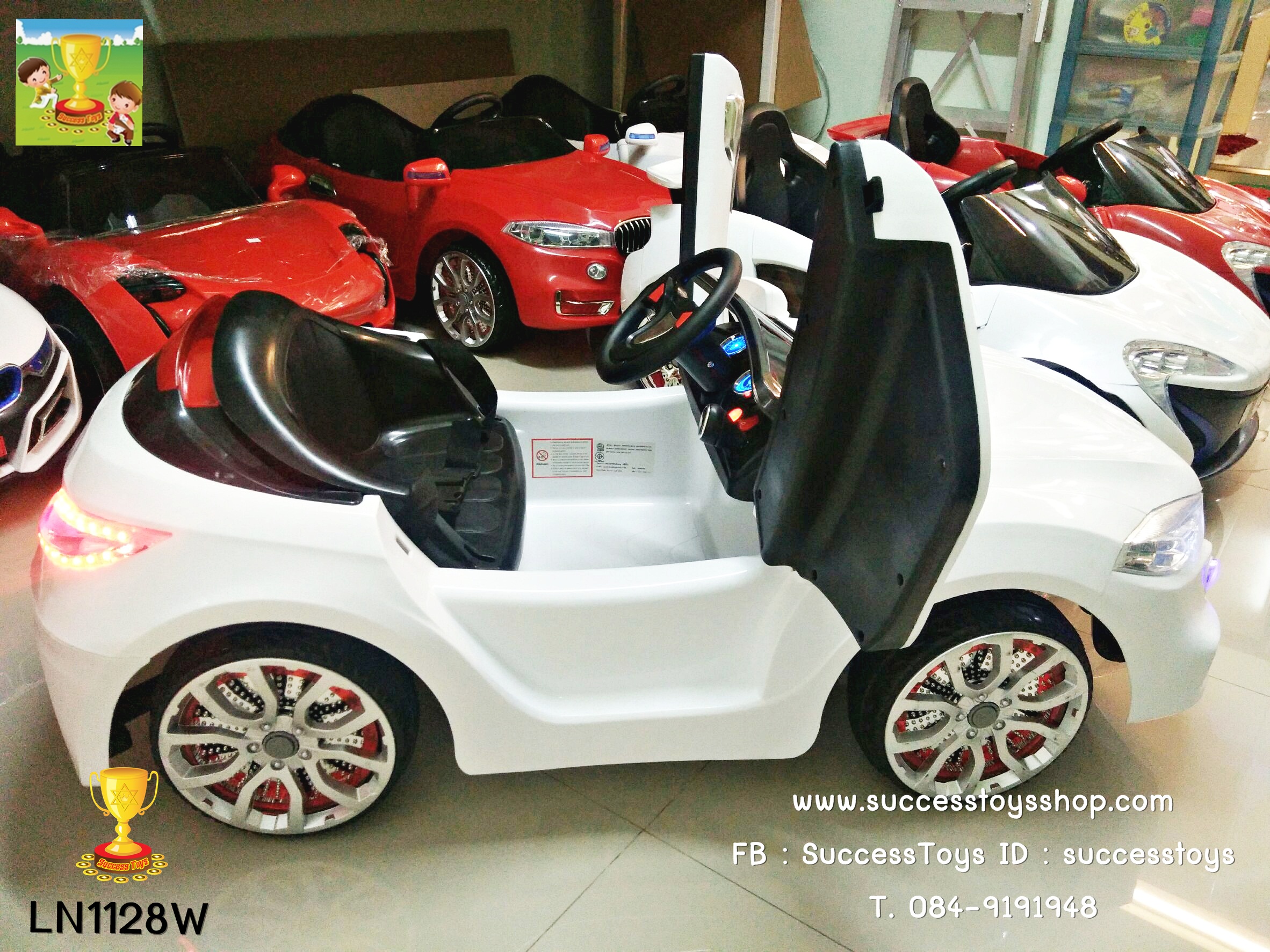LN1128W รถแบตเตอรี่เด็กนั่งไฟฟ้า ยี่ห้อ BMW ประตูปีกนก มี 2 สี ขาว / แดง
