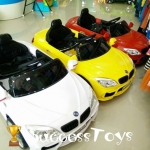 รถแบตเตอรี่เด็กนั่งไฟฟ้า รุ่น LN5618 ยี่ห้อ bmw เปิดประตูได้ 2 แบต 2 มอเตอร์ มี 4 สี ขาว แดง เหลือง ดำ