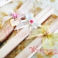 ของชำร่วยงานแต่ง พัดไม้ฉลุ ผูกโบว์ ติดดอกสา ชิ้นละ 25.-